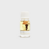 A transparent bottle containing a yellow liquid with flower buds and spices, labeled 'Cozy & Comfy'.
